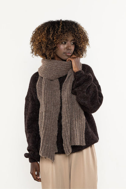Chic winter wrap scarf by Awama, combining kid mohair and wool for a luxurious, soft touch and versatile wear.