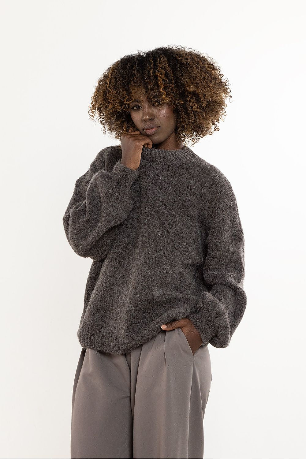 Luxury women's wool and kid mohair sweater by awama, showcasing a minimalist design in a warm and light fabric.