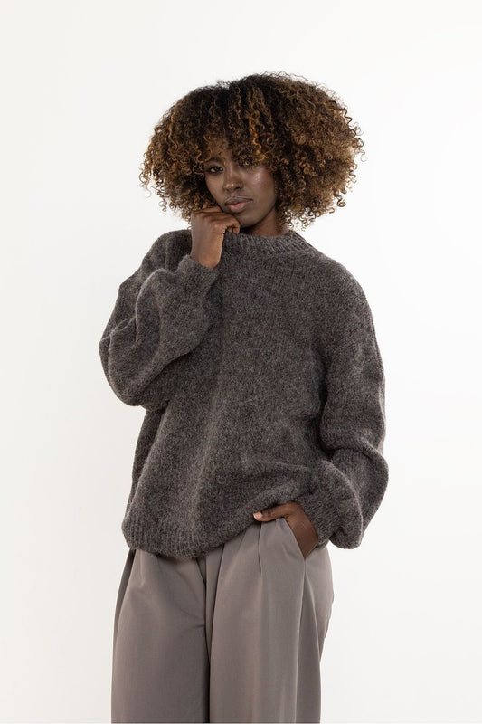 Luxury women's wool and kid mohair sweater by awama, showcasing a minimalist design in a warm and light fabric.
