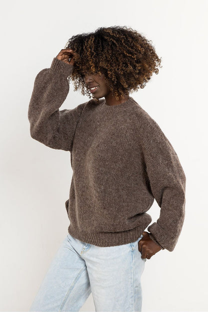 Close-up of Awama women's sweater, highlighting the soft texture and natural warmth of wool and kid mohair materials.
