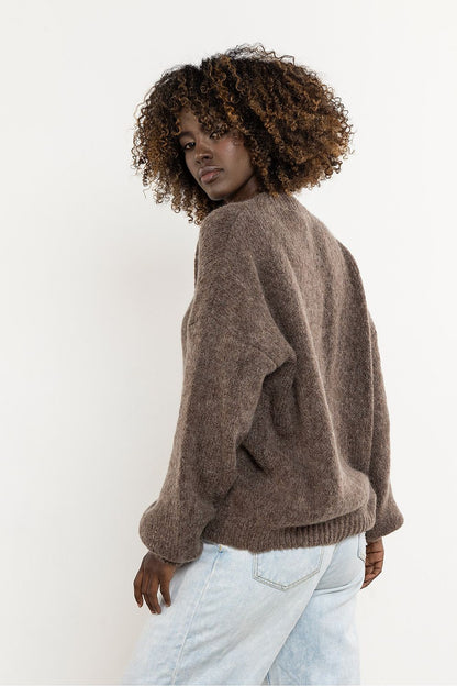 Versatile Awama wool and kid mohair women's sweater, exemplifying luxury and comfort for all seasons.