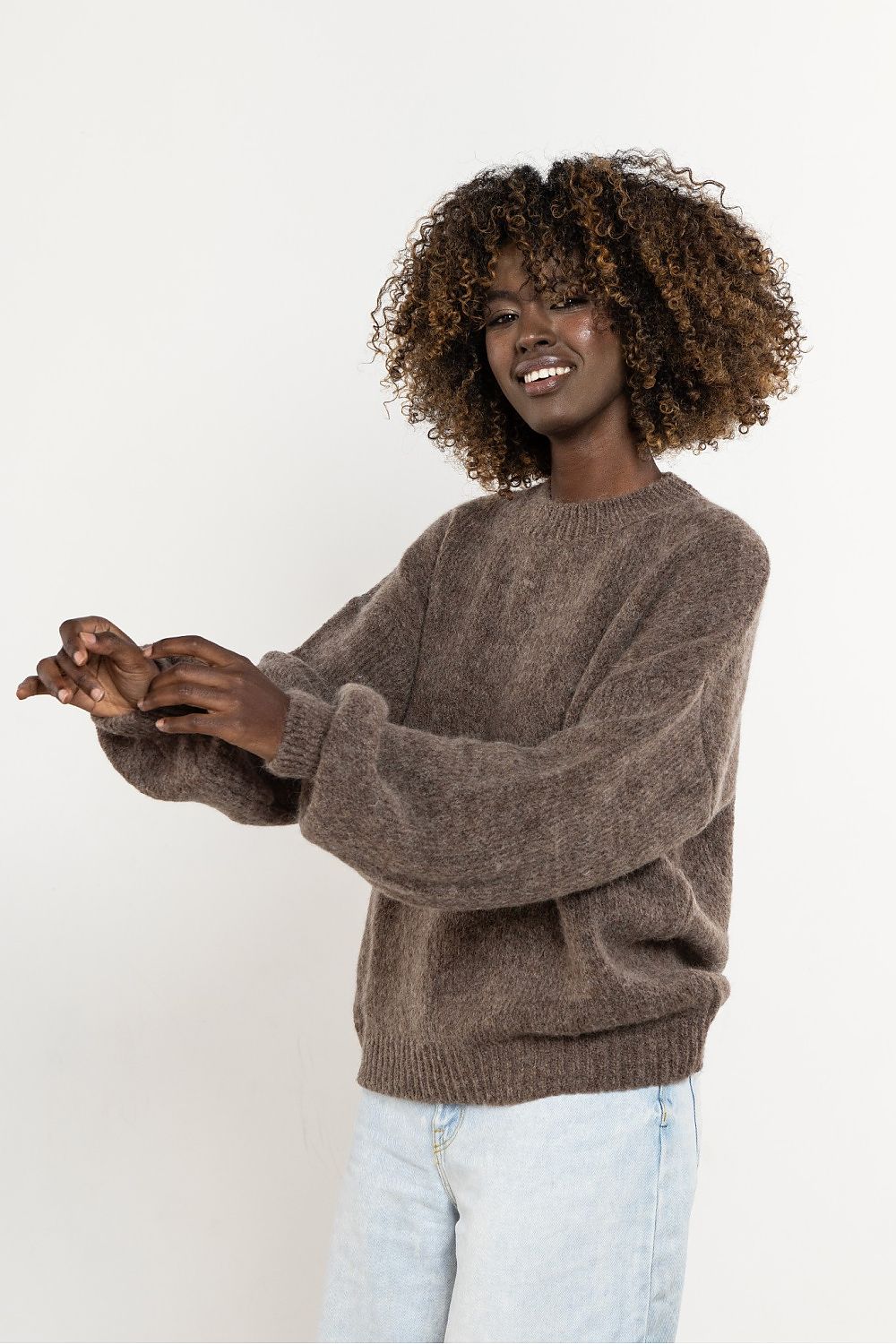 Detailed shot of the high-quality knit pattern on Awama women's sweater, representing the craftsmanship from Poland.