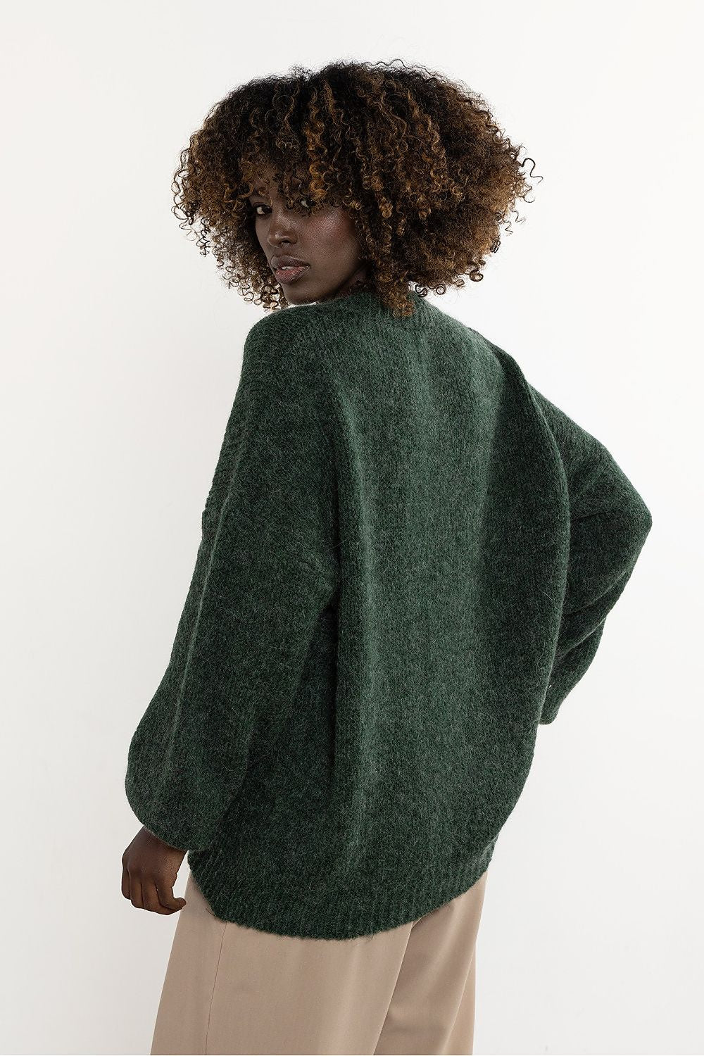 Luxurious Awama women's sweater made from a blend of wool and kid mohair, showcasing a minimalist style in soft, natural textures. Perfect for the fashion-forward woman.