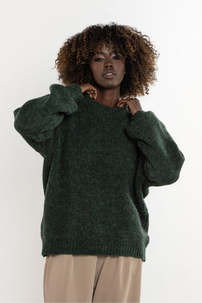 Close-up of the Awama wool and kid mohair women's sweater, highlighting its meticulous craftsmanship and premium quality, designed for ultimate comfort and warmth.