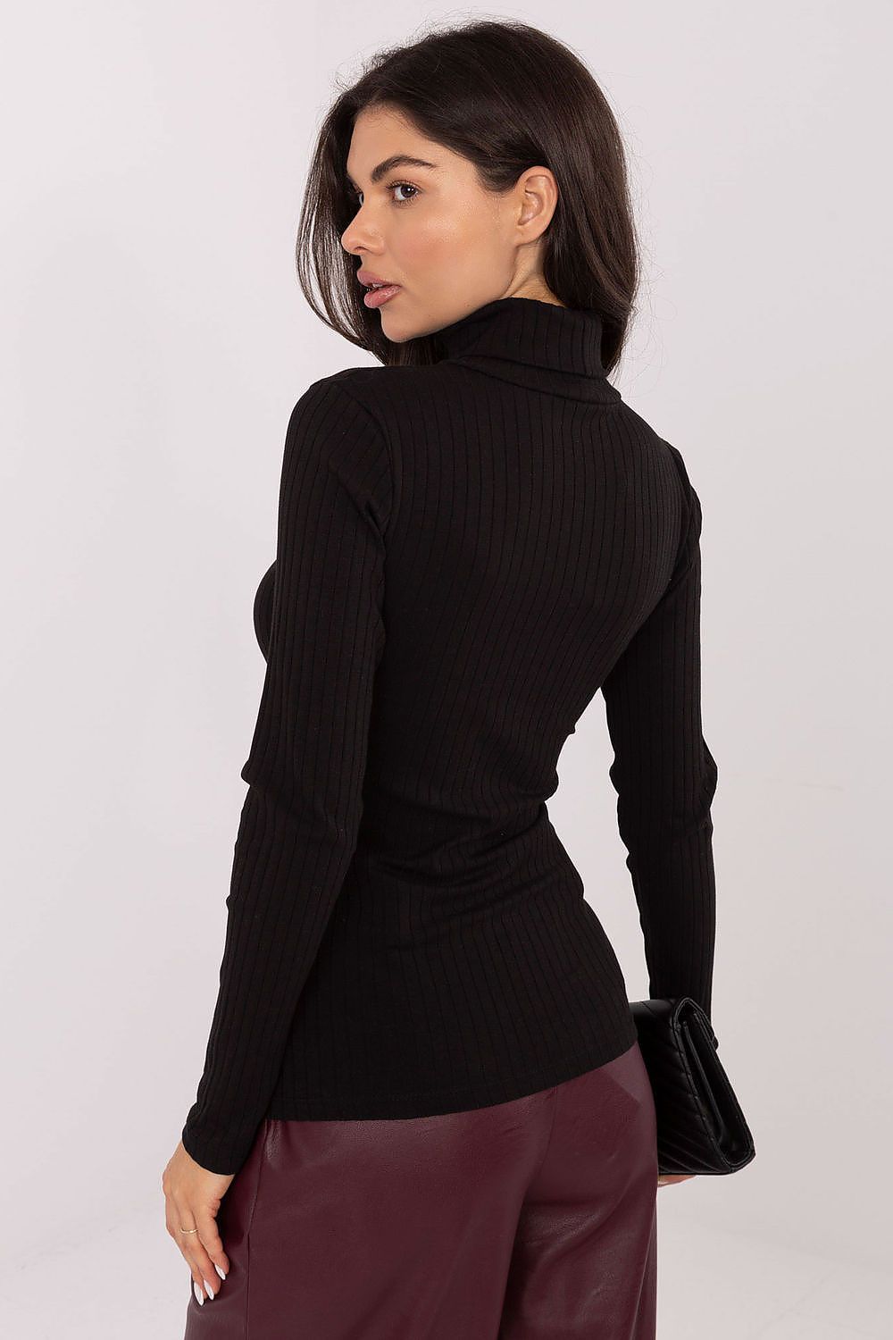 Women's ribbed turtleneck by Rue Paris available in sizes S/M and L/XL, exemplifying elegant minimalism and practical chic.