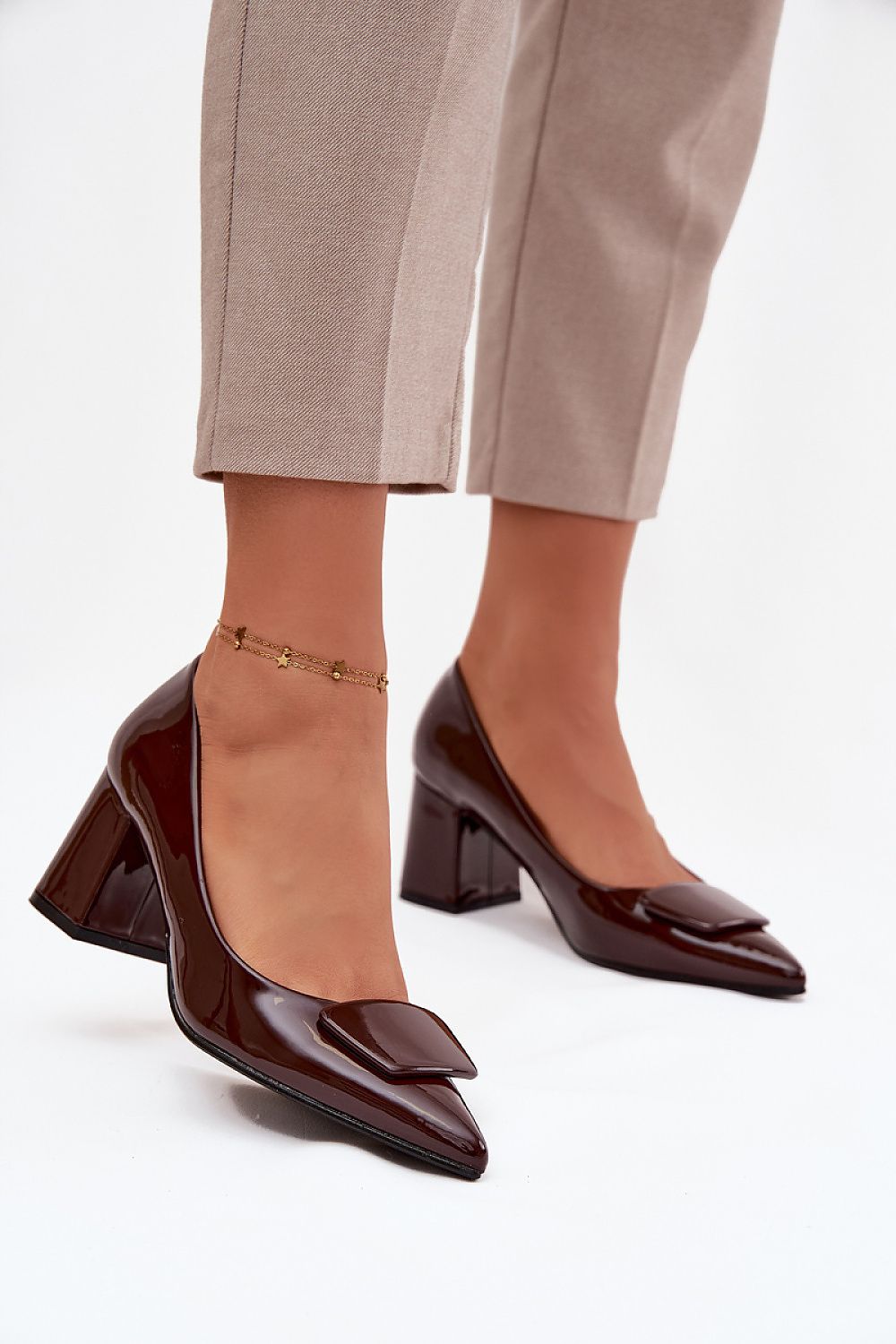 Elegance Redefined Women's Eco-Leather Block Heel Pumps by Step in Style, showcasing a timeless design with pointed toes and a stable heel, ideal for both work and formal occasions.