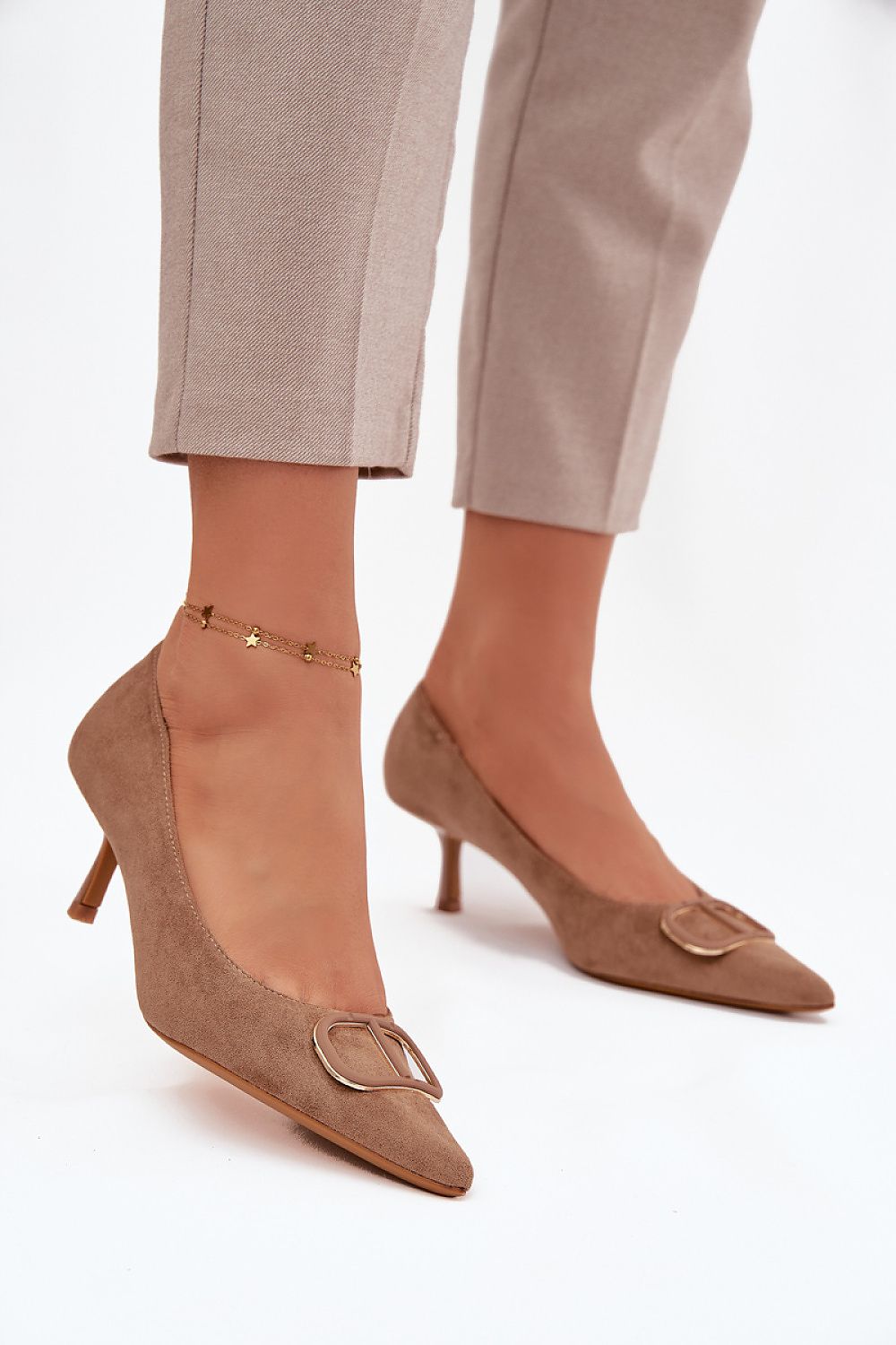 Close-up of the decorative detail on Step in Style's elegant eco suede high heels for women with a slim heel and stylish pointed toe.