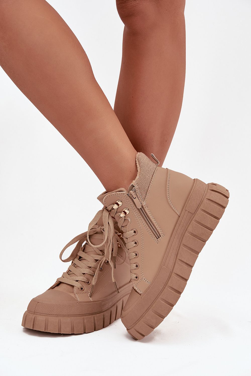 Stylish Ladies' Faux Leather Ankle Boots featuring a sleek design and sturdy 4cm platform, crafted by Step In Style for urban chic looks.