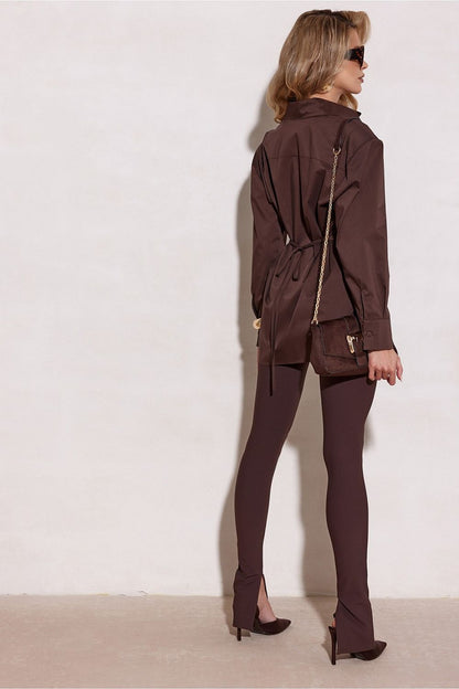 A fashion ensemble featuring Roco Fashion's long sleeve cotton blend shirt, styled elegantly for an evening outing.