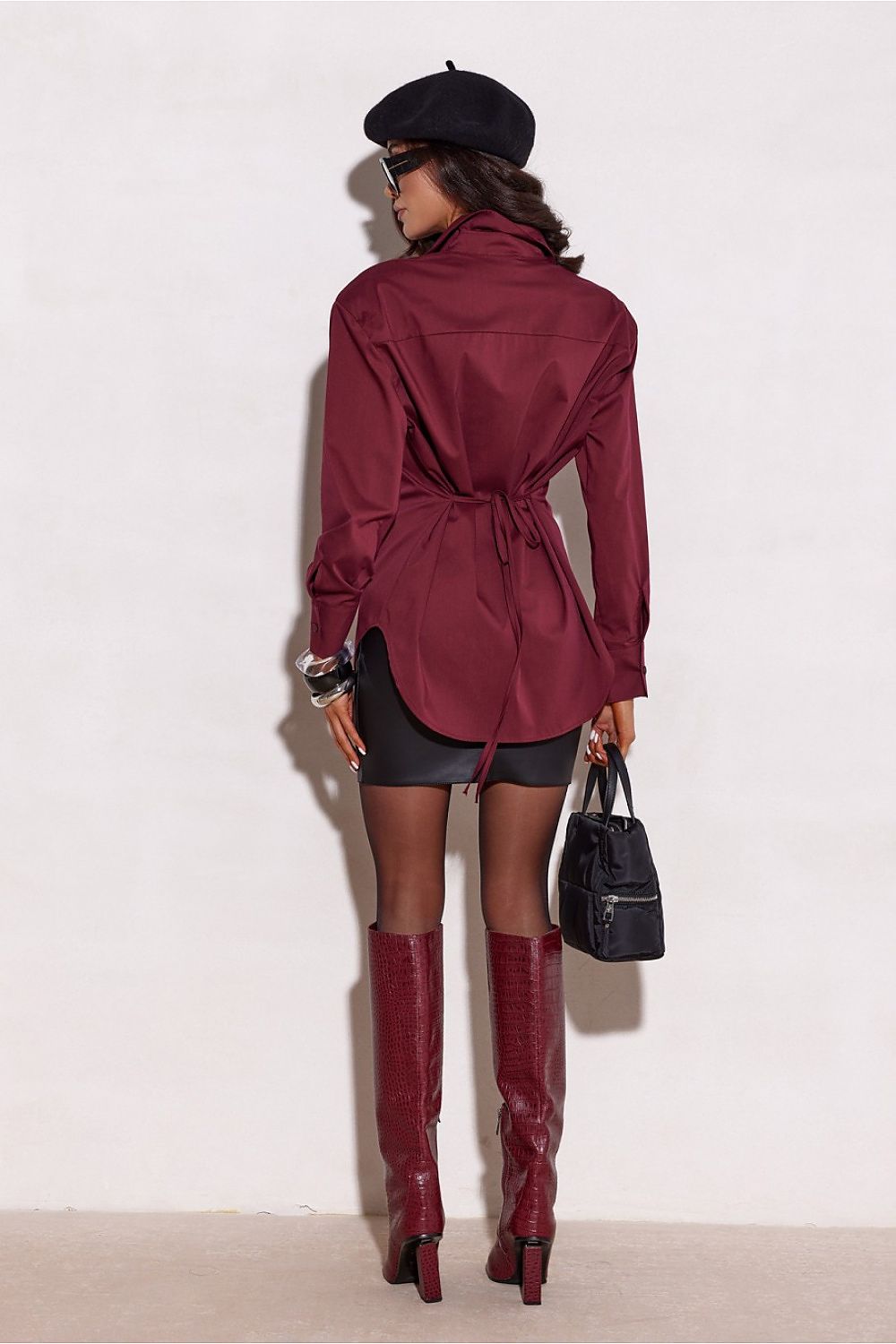 Stylish outfit featuring Roco Fashion's elegant long sleeve shirt paired with fitted trousers, perfect for creating chic office and evening looks.