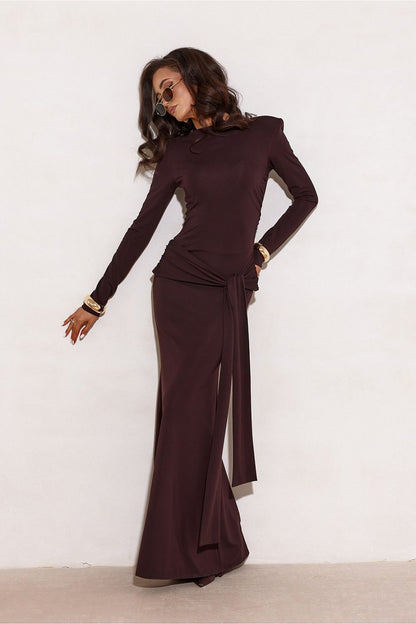 Close-up of the stylish sash detail on the Elegant Long Sleeve Long Dress by Roco Fashion, showcasing refined craftsmanship and flattering fit.