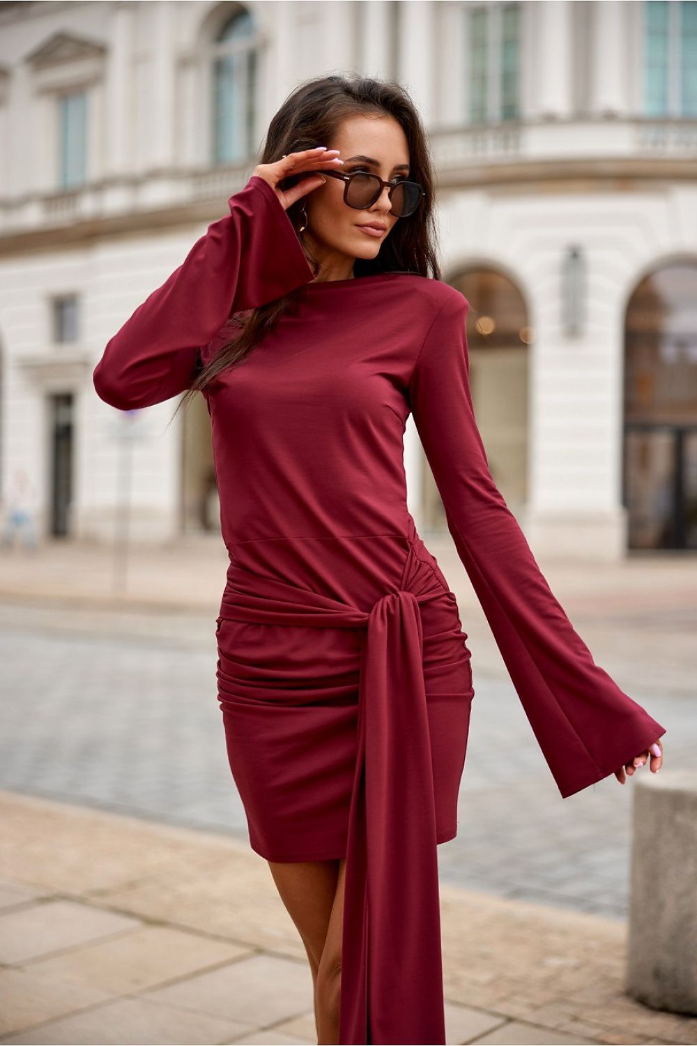 Detailed shot of the luxurious fabric blend of the elegant long sleeve dress by Roco Fashion, featuring spandex, nylon, and viscose for ultimate comfort.