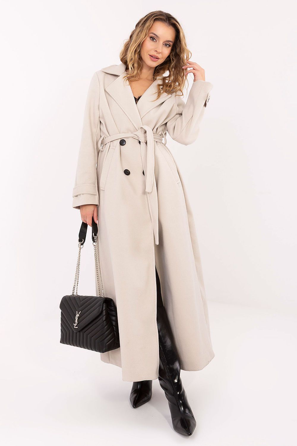 Model showcasing the stylish fit of a double-breasted women's long coat with inset pockets by Factory Price, combining elegance with functionality.