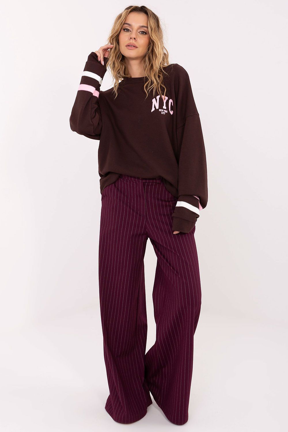 Fashionable women's sweatshirt with round neckline and striped sleeves, ideal for stylish comfort by Factory Price.