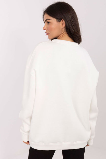 Side view of stylish loose fit luxury women's sweatshirt from Factory Price, perfect for pairing with jeans or leggings.
