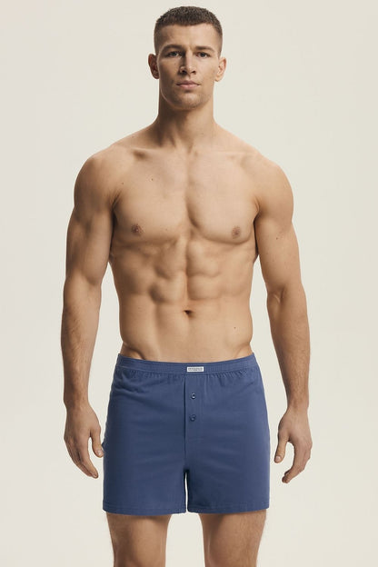 Henderson Men's Cotton Boxer Shorts featuring a minimalistic design in a luxury lifestyle setting, showcasing comfort fit and breathable fabric for superior everyday wear.