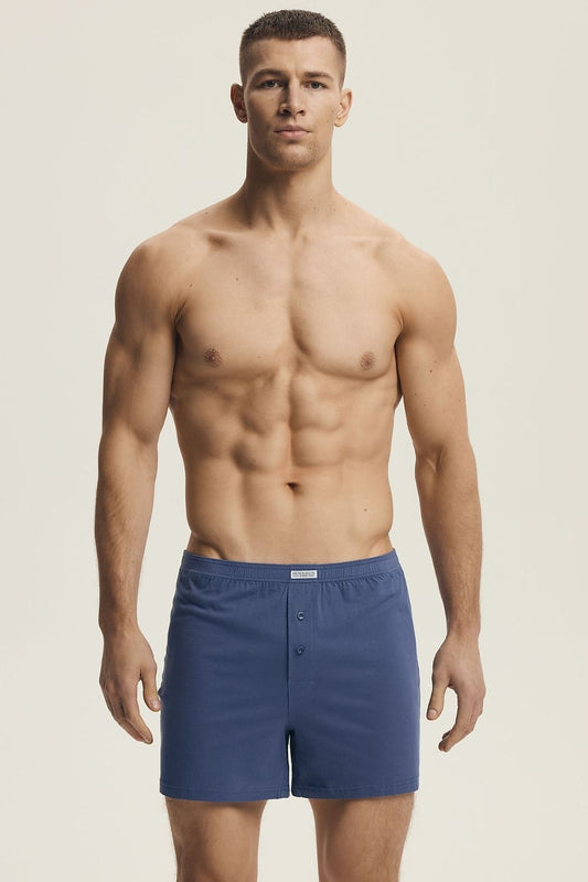 Henderson Men's Cotton Boxer Shorts featuring a minimalistic design in a luxury lifestyle setting, showcasing comfort fit and breathable fabric for superior everyday wear.