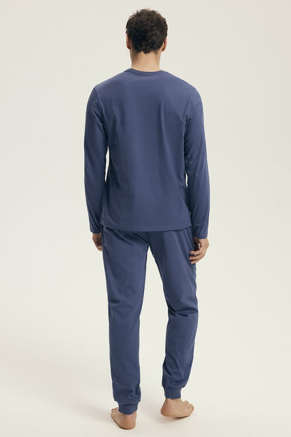Luxury Henderson Men's Cotton Pyjama Set featuring an adjustable waist, elegantly packed for a perfect gift. Includes a long-sleeved shirt with a subtle print and comfortable pants with pockets.