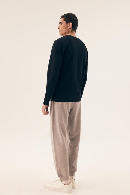 Stylish presentation of Henderson Men's Long Sleeve Undershirt 2-Pack, emphasizing the classic design and premium quality of the cotton blend.