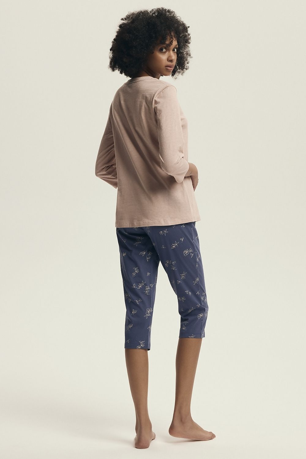 Elegant Henderson women's pyjama set showcasing a breathable fabric, stylish print, and relaxed fit pants, perfect for chic lounging in the evenings.