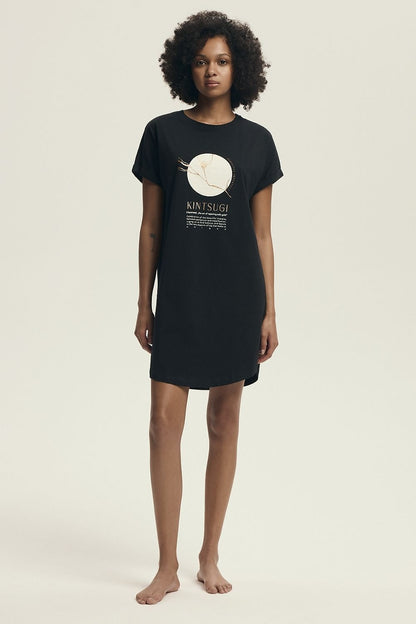 Luxurious Henderson cotton nightshirt featuring a semi-circular hem, perfect for year-round comfort and style, available in sizes S to XL.