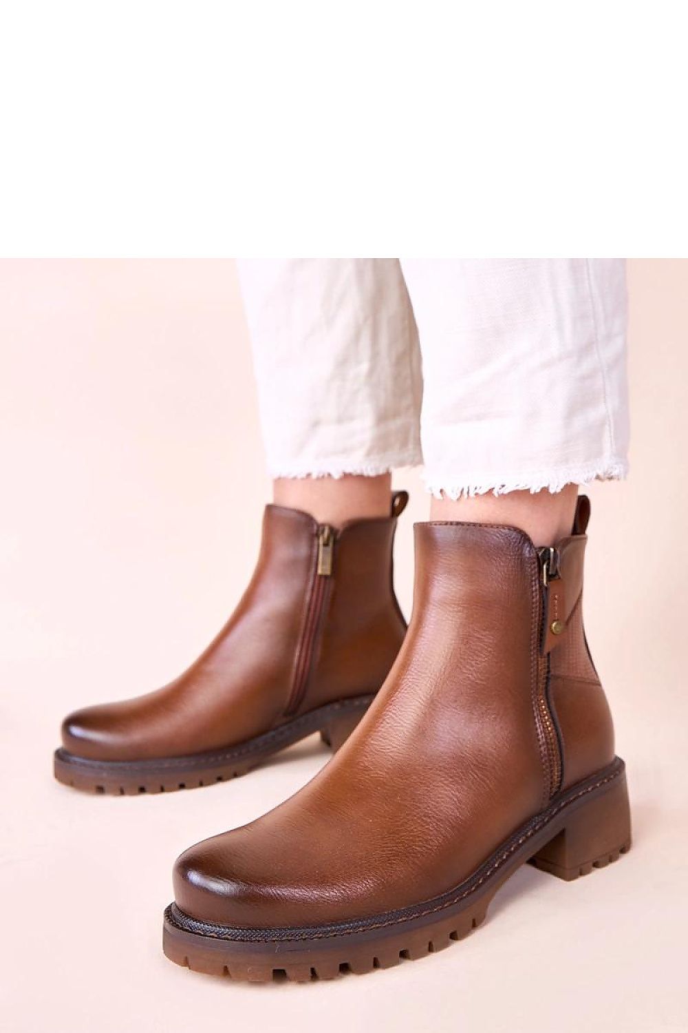 Solea Brown Ankle Boots featuring a decorative zipper and elegant 4.5cm heel, perfect for stylish women's fashion.