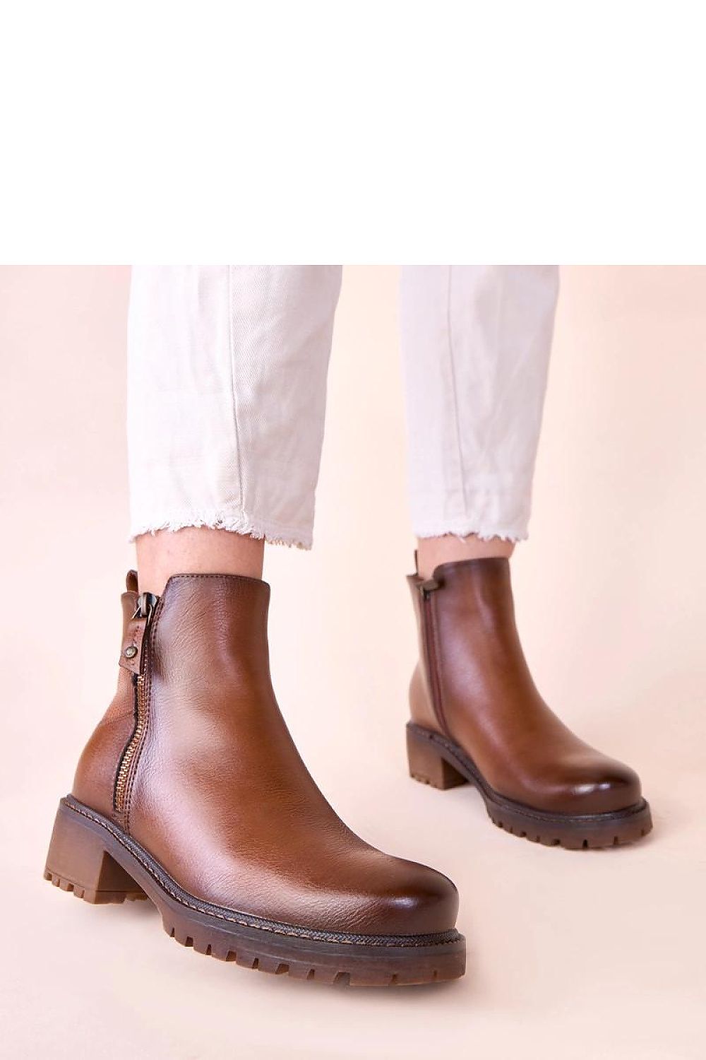 Elegant Solea Terina brown ankle boots showcasing premium craftsmanship and a chic design, ideal for casual and formal occasions.