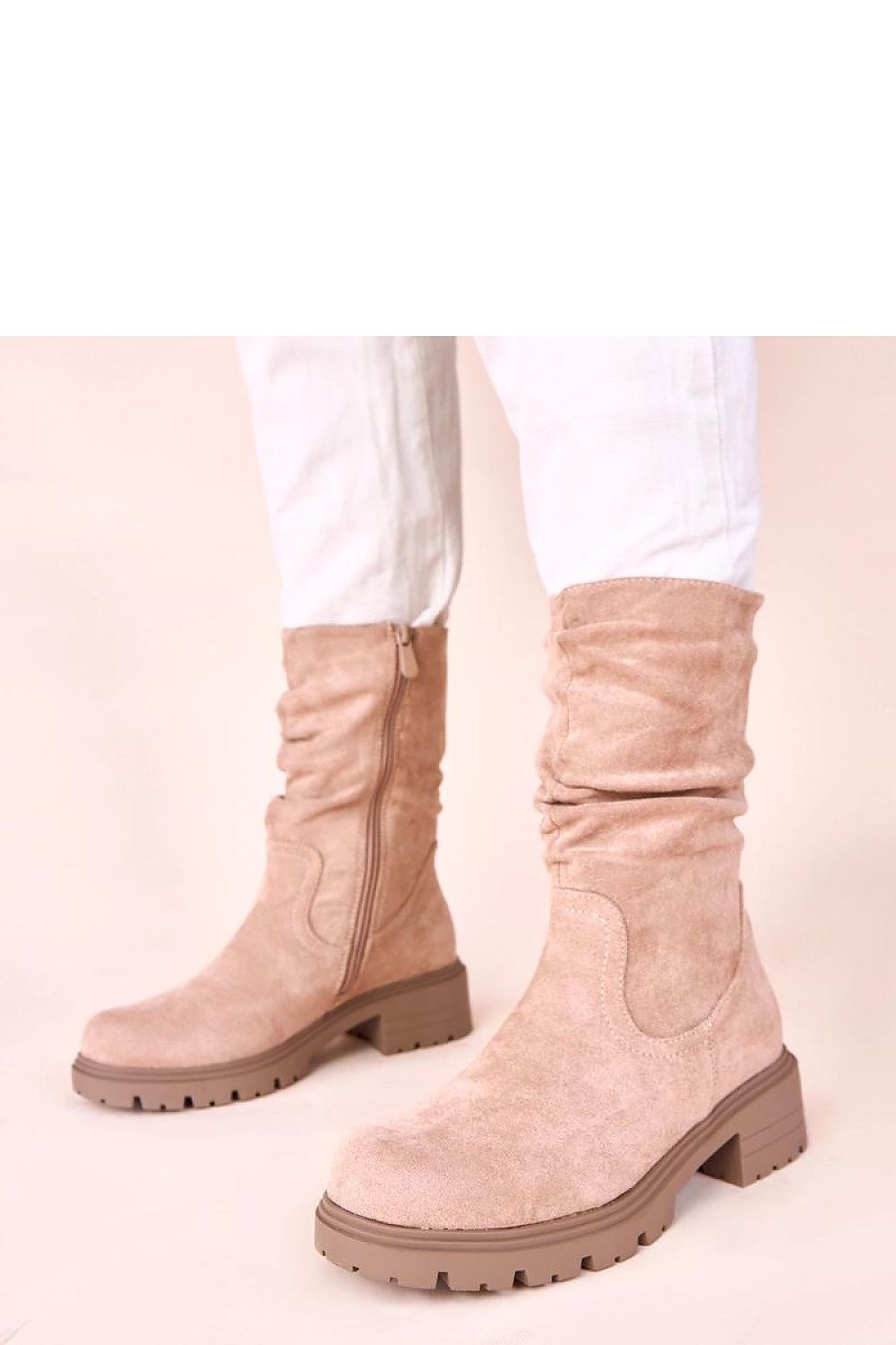 Fashion-forward beige ruched platform boots from Solea, offering durability and all-day comfort while enhancing your individuality with their sleek design.