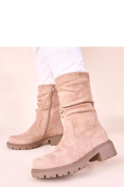 Luxury beige ruched platform boots by Solea, showcasing elegant design and comfort for autumn-winter fashion.