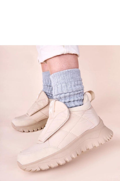 Solea Penny beige snow boots showcasing premium craftsmanship and a cosy interior, perfect for chic winter fashion and safe navigation through snow.