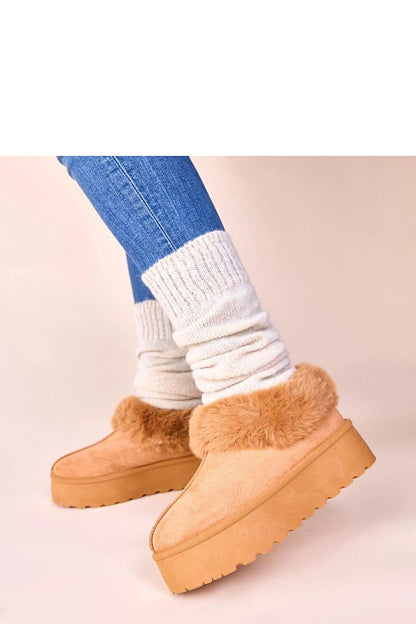 Deesi Women's dark beige fur-lined snow boots showcased on a winter landscape, ideal winter footwear for style and warmth from Solea.