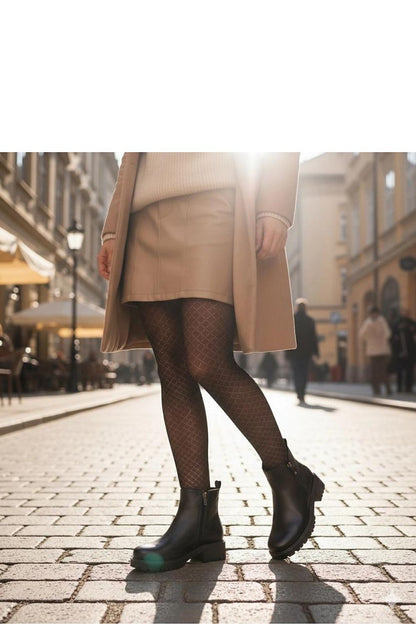 Close-up view of Solea Terina brown ankle boots featuring a decorative zipper, embodying luxury and comfort for modern women.