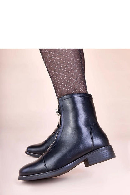Close-up of Solea Luxury Synthetic Leather Boots, showcasing the quality synthetic leather and stylish zipper design, perfect for winter fashion.