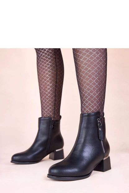 Elegant black block heel ankle boots from Solea, featuring a chic metallic insert, perfect for sophisticated fashion.