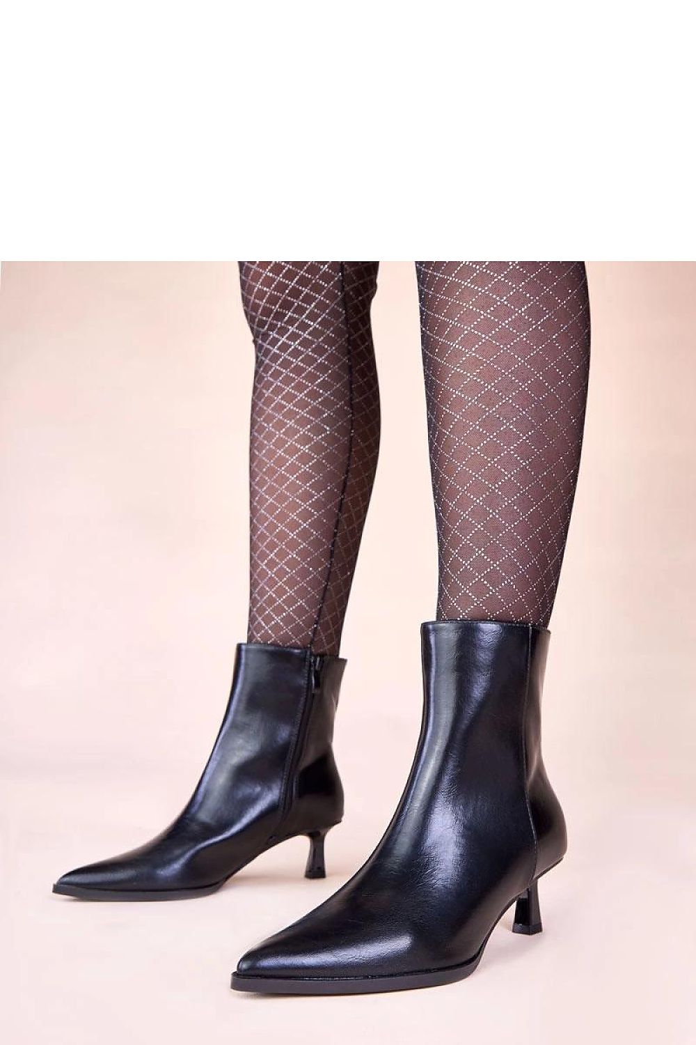 Chic black ankle boots from Solea, designed in a fashionable duck style with a subtle stiletto heel, epitomising luxury and versatility for casual and formal occasions.
