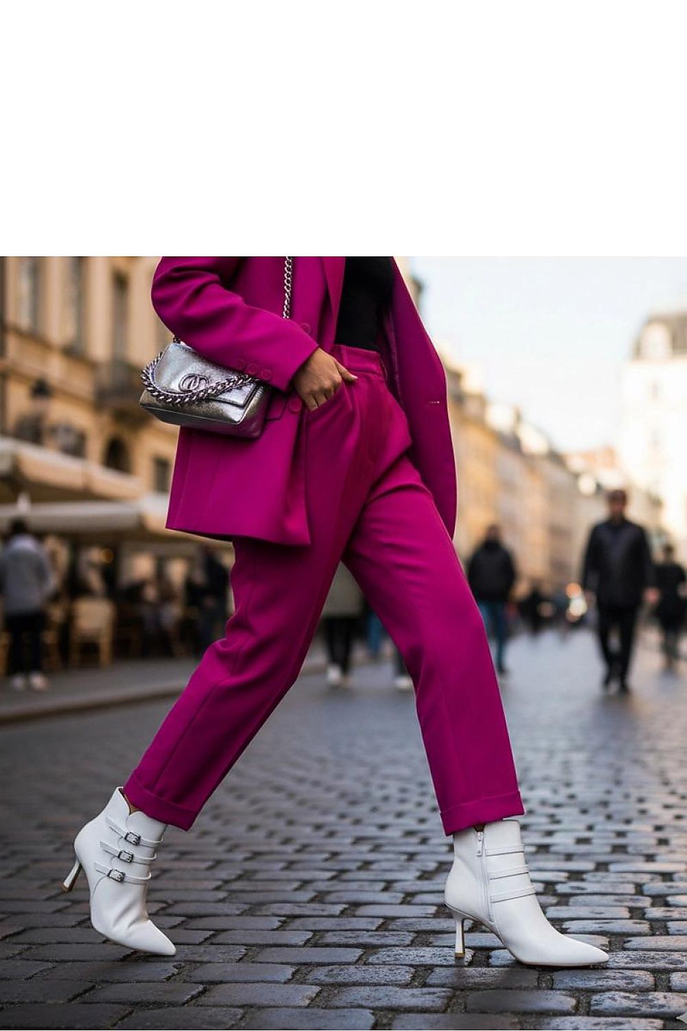 Close-up of Solea Black Heeled Ankle Boots revealing exquisite decorative buckles and luxurious artificial leather, ideal for stylish elegance this season.