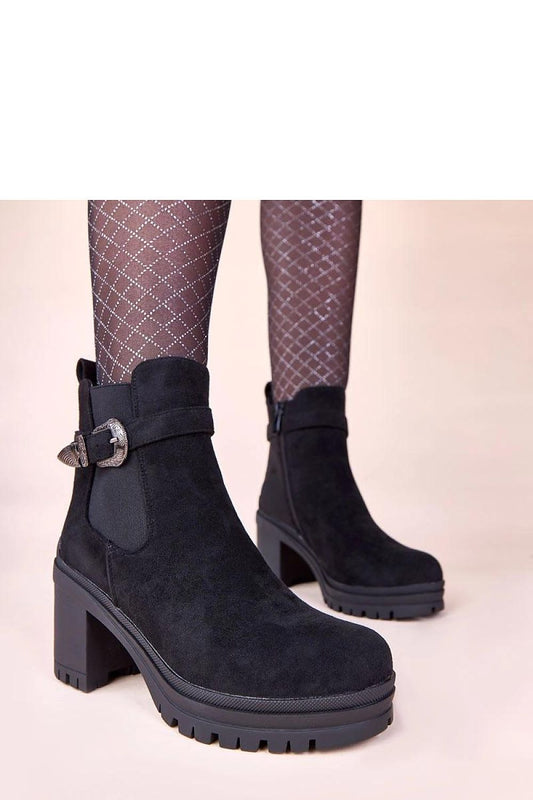 Elegant black ankle boots by Solea, model Gwella, featuring a decorative buckle and 8cm heel, perfect for any stylish outfit.