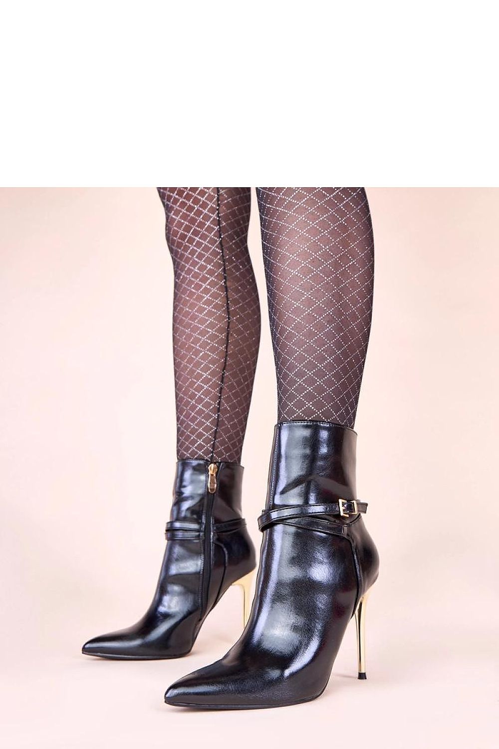 Fashionable beige ankle boots styled with chic outfits, perfect for day to night versatility, exuding elegance and confidence.