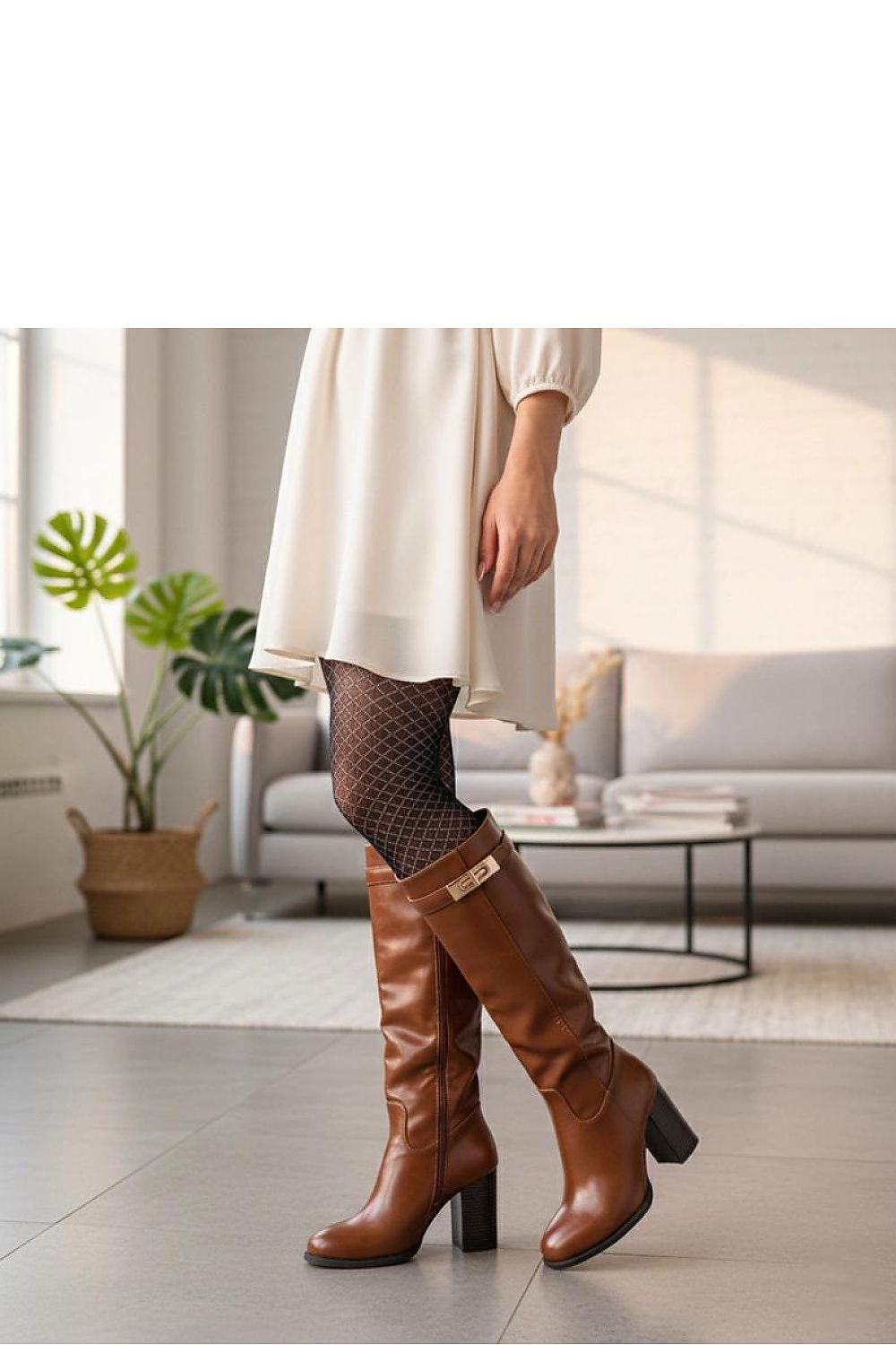 Elegant Solea Tessa Brown Heeled Boots with a sophisticated gold accent, ideal for any fashionable occasion.