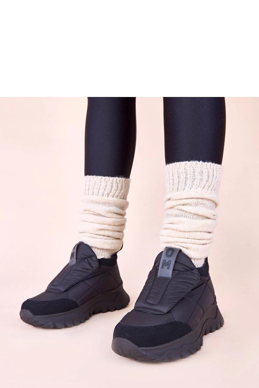 Elegant Solea Penny beige women's snow boots featuring stylish Velcro fastenings, showcasing luxury craftsmanship for winter warmth.