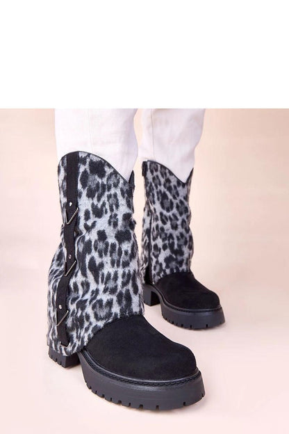 Solea Kaylia black ankle boots featuring a luxurious leopard-print rolled shaft, ideal for stylish women.