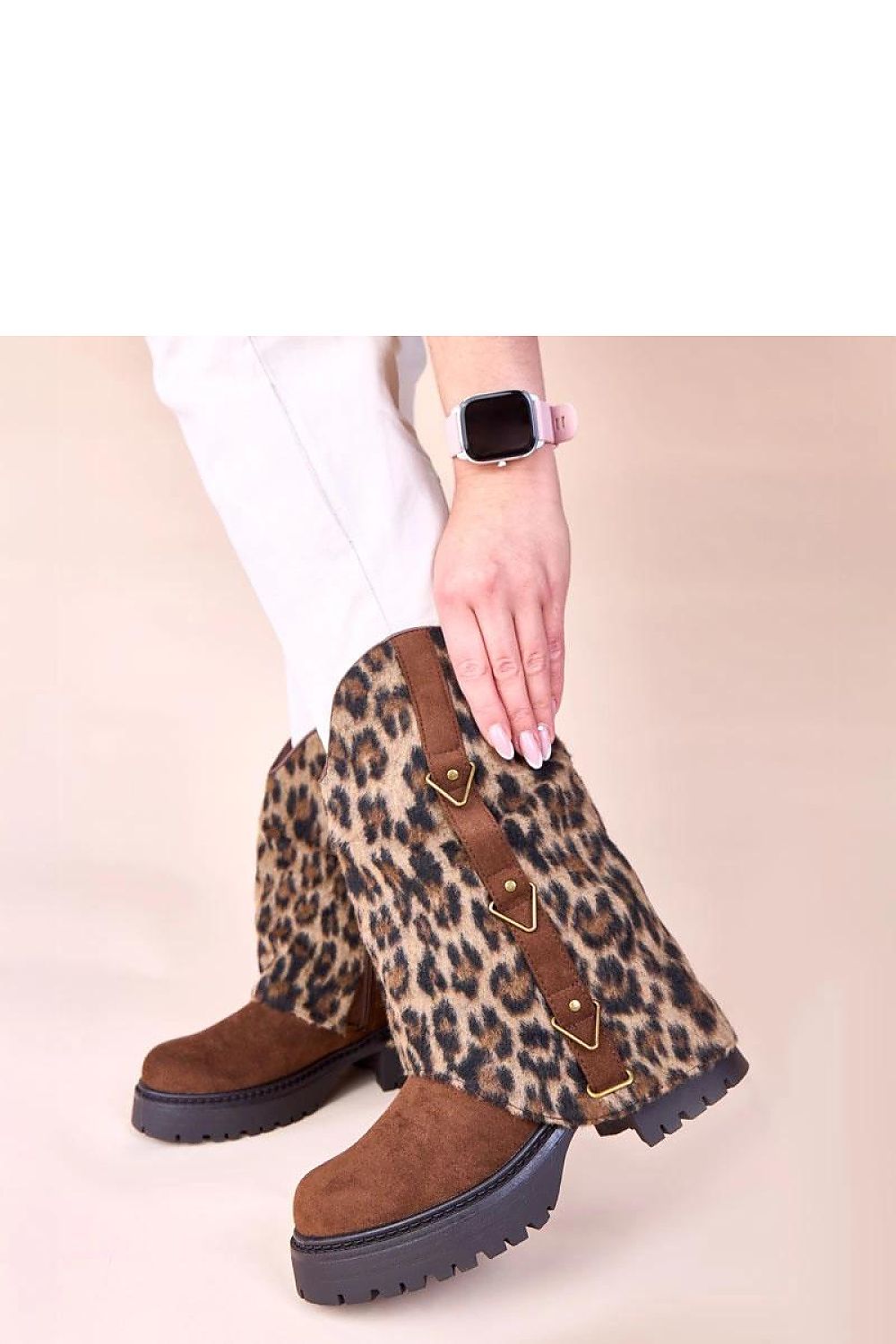 Solea Kaylia ankle boots in black with a chic leopard-print rolled shaft, perfect for versatile outfits.