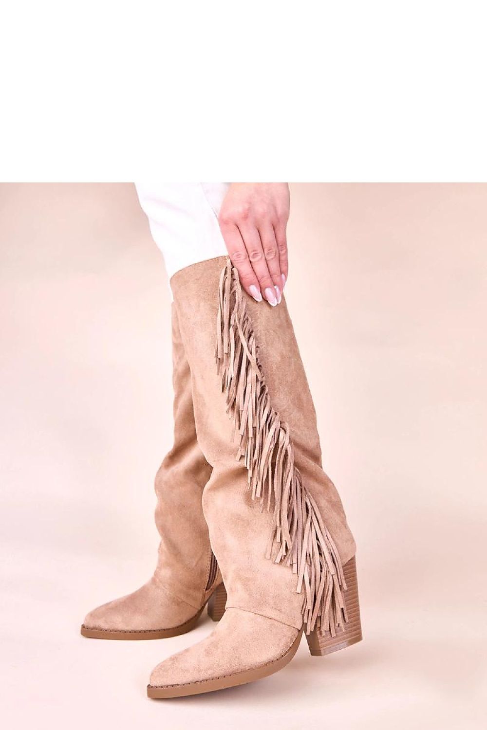 Detailed view of the stylish fringes on Gemre's beige cowboy ankle boots, perfect for adding a touch of wild elegance to any outfit.