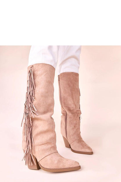 Lifestyle image displaying Gemre's sophisticated beige cowboy ankle boots, beautifully paired with casual and formal wear, ideal for versatile fashion.