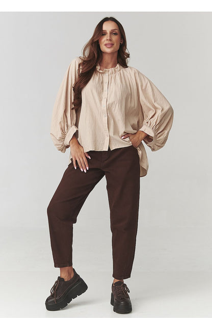 Full view of Makadamia Women's Oversize Cotton Shirt on a model, capturing the flowing drape and comfortable fit, perfect for a chic yet relaxed outfit.