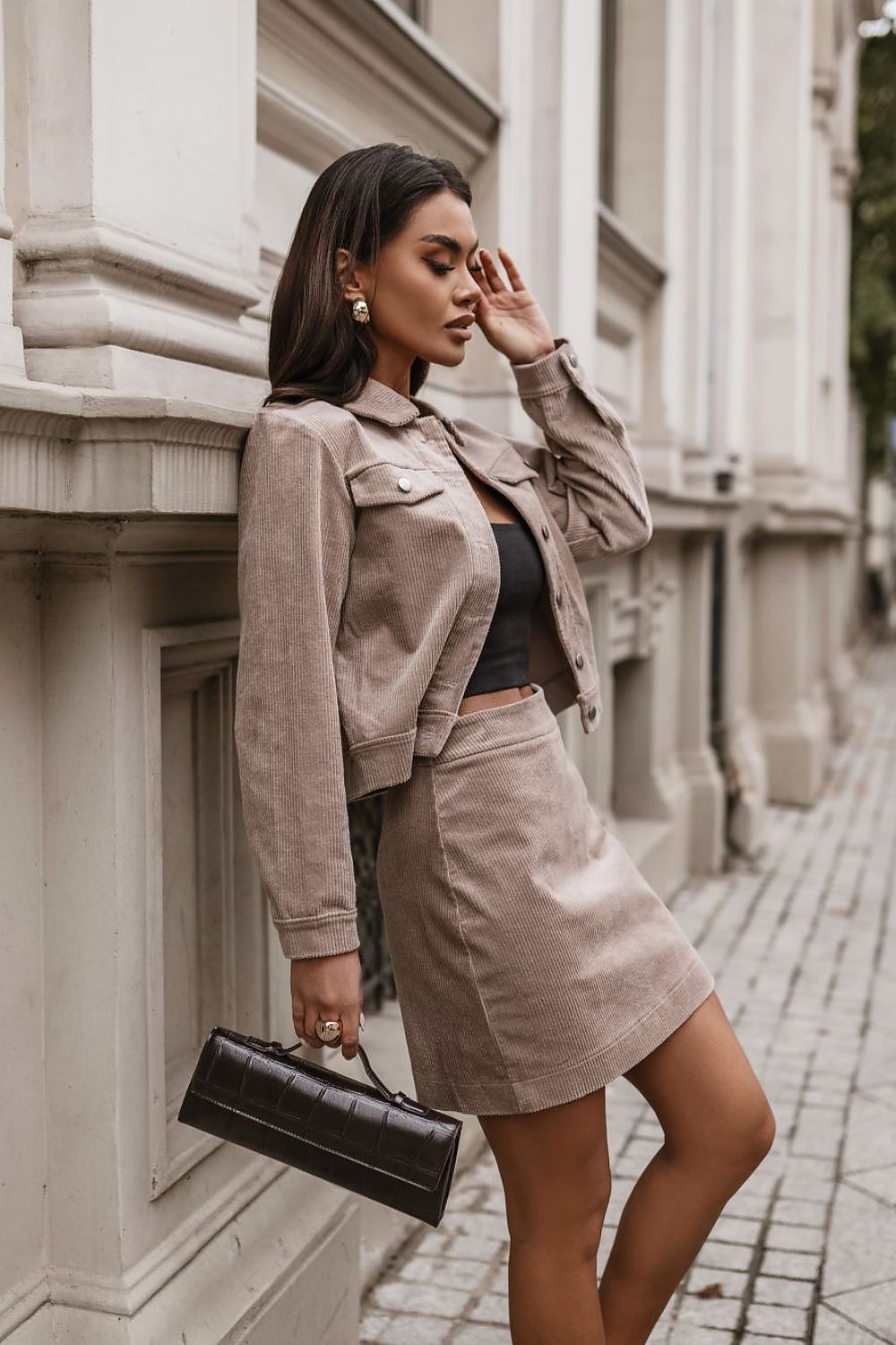 Luxury Cotton Corduroy Jacket and Mini Skirt Set by IVON, showcasing soft elastic cotton material in a stylish design, perfect for versatile daily or evening wear.