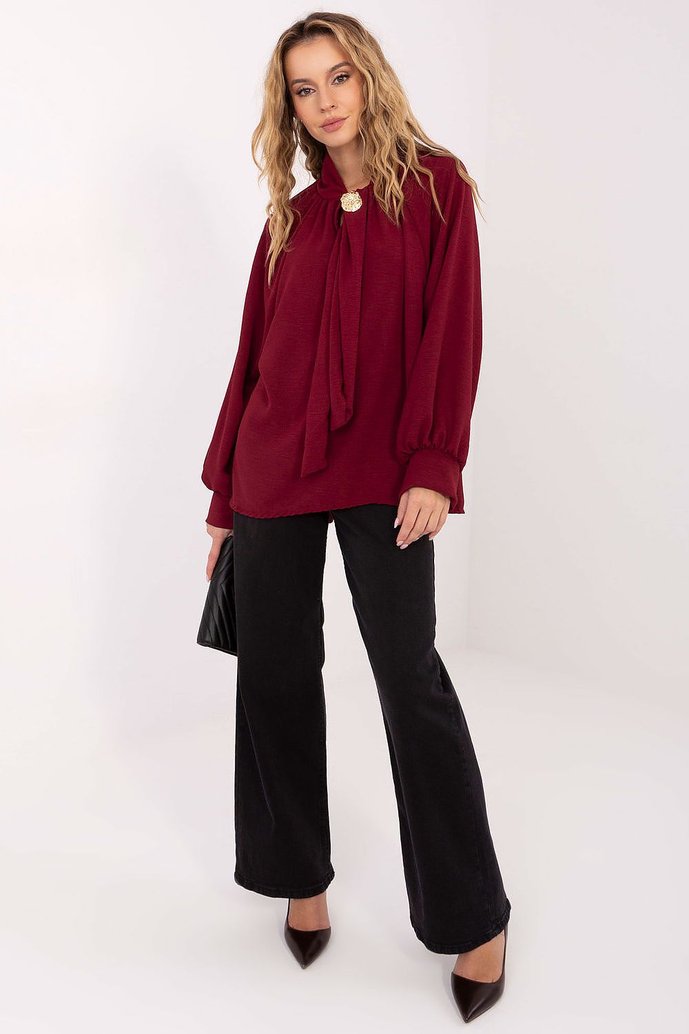 Elegant women's viscose blouse in soft fabric, featuring long sleeves and a stylish tie neckline, perfect for sophisticated occasions.