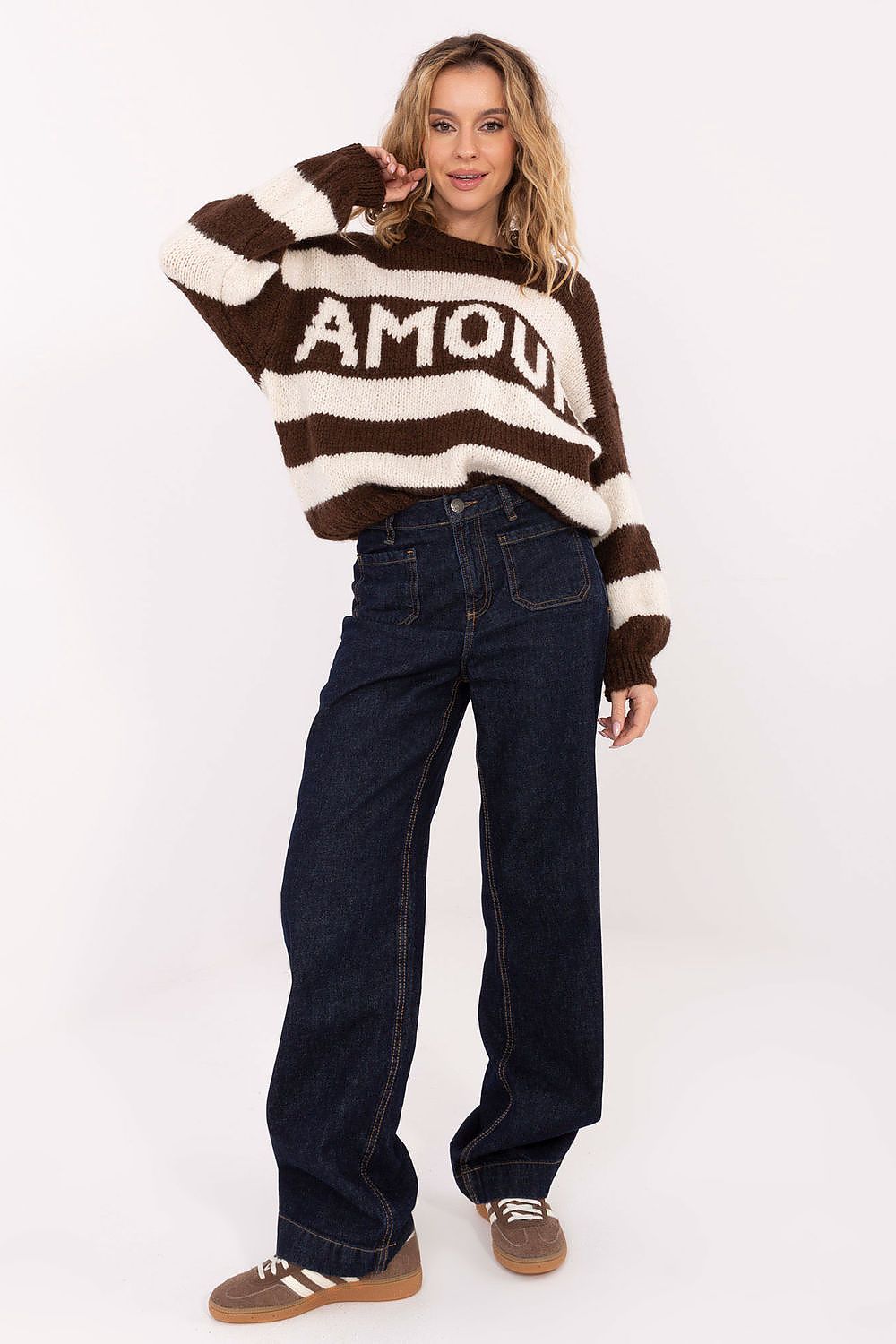 Elegant casual style of Italy Moda's women's oversized striped sweater, showcasing a fashionable striped pattern designed for comfort and warmth.