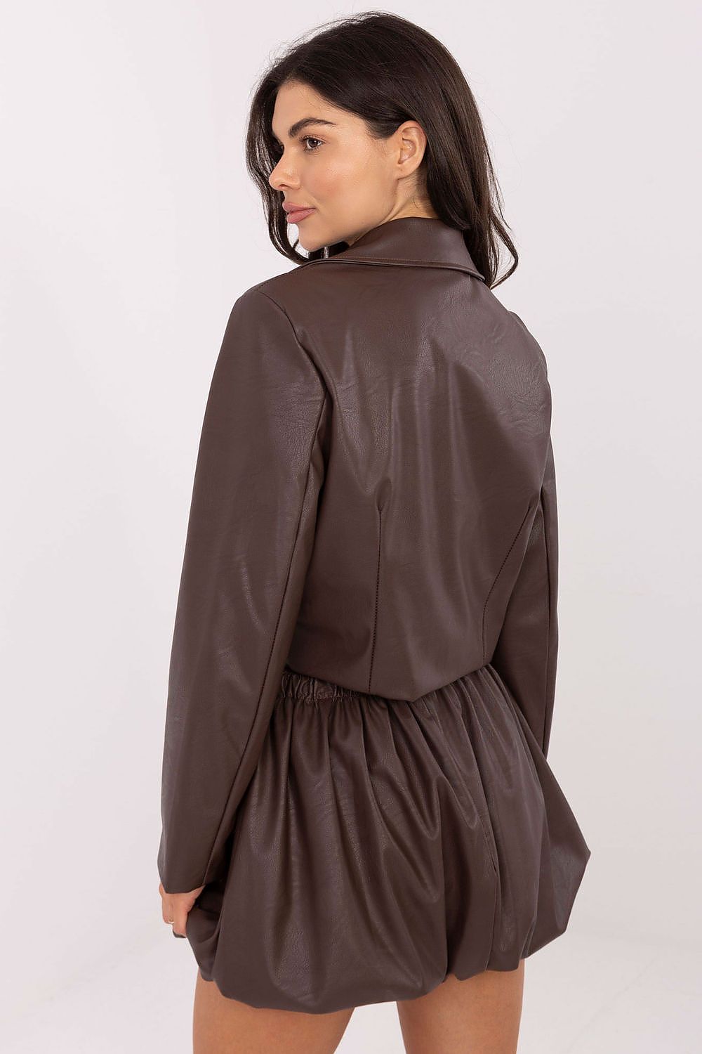 Italy Moda elegant imitation leather mini skirt with elastic waistband, showcasing a modern urban style and luxurious comfort in EU size 0.