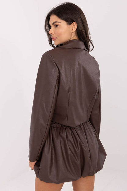 Italy Moda elegant imitation leather mini skirt with elastic waistband, showcasing a modern urban style and luxurious comfort in EU size 0.